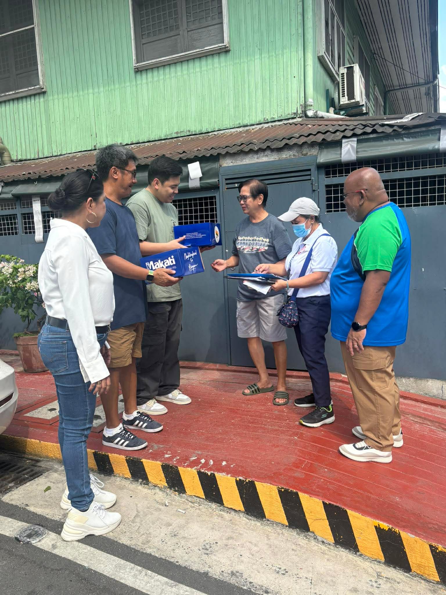 Cake Distribution with Capt. Miko Villena